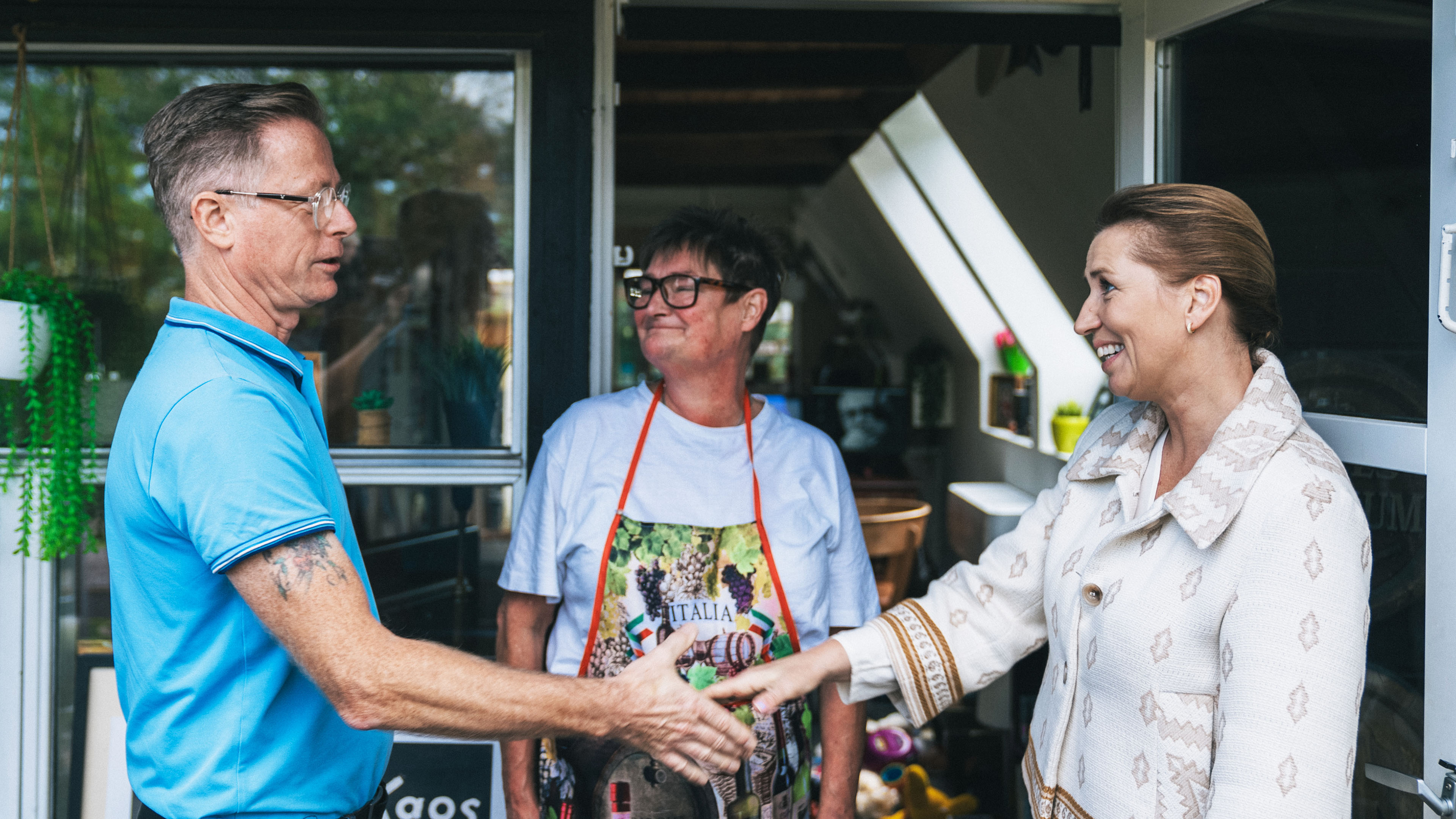 Formand Finn, Tina og statsminister Mette Frederiksen. 