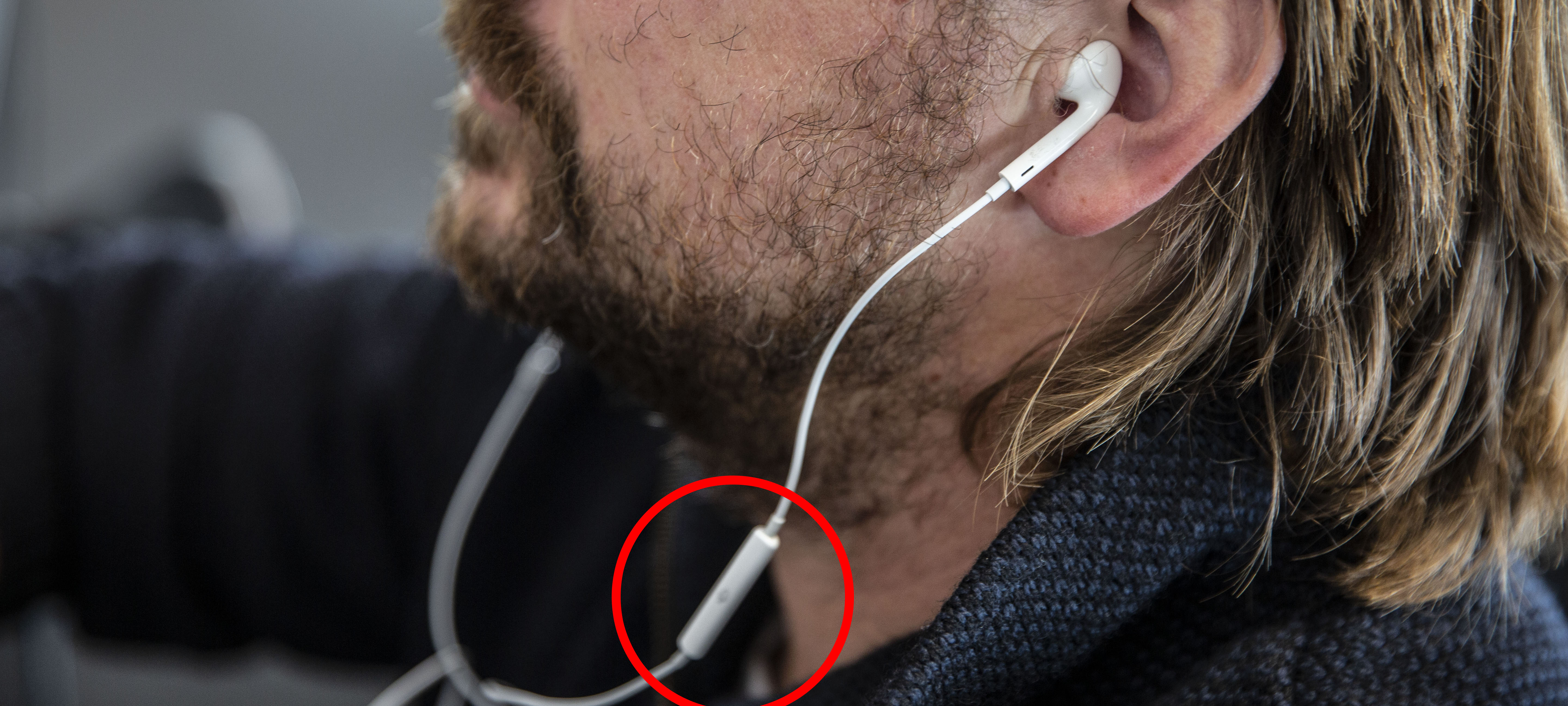 By using a headset with a microphone (the red circle), the noise from your surroundings is reduced and the viewers are able to hear you more clearly.